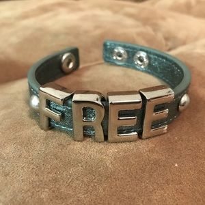 BCBG inspiration quote faux leather snap bracelet